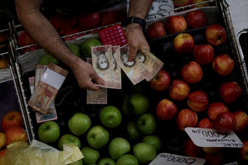 Venezuela bỏ tiền giấy mệnh giá cao nhất