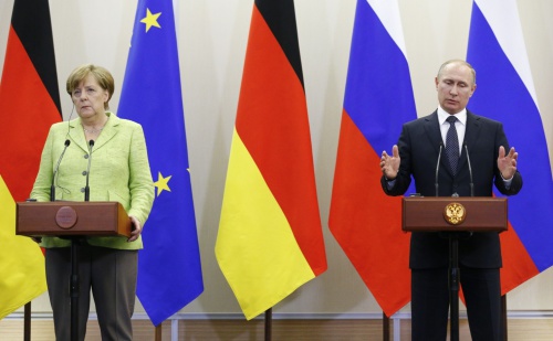 Putin - Merkel lên tiếng về can thiệp bầu cử