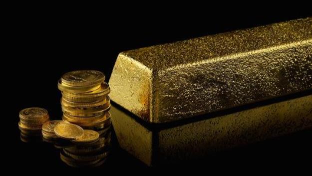 Vàng xuống đáy 2 tháng khi đồng USD tăng mạnh.