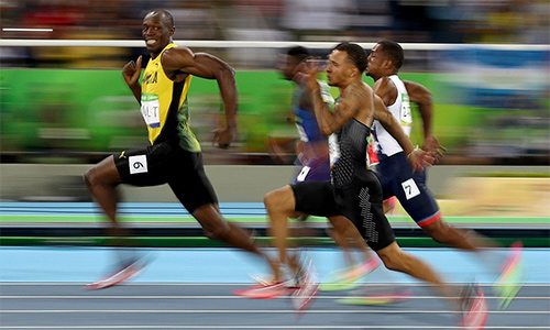 Usain Bolt và cái cúi đầu của nhà vô địch
