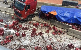 Sau tiếng nổ lớn ở lốp xe, hàng nghìn chai bia vỡ tung toé trên đường