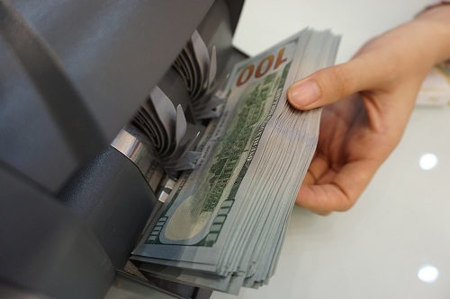 Phạt 90 triệu đồng vì đổi 100 USD - Đúng quy định nhưng chưa 'thuận tình'